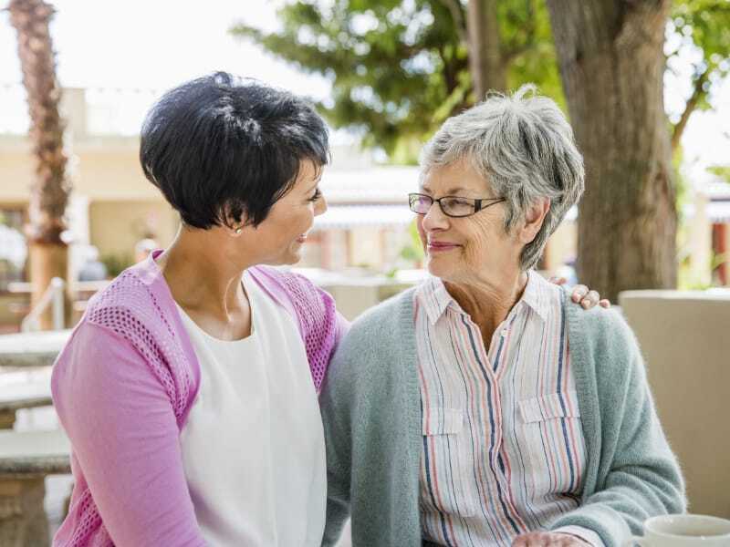 mother and daughter smiling together